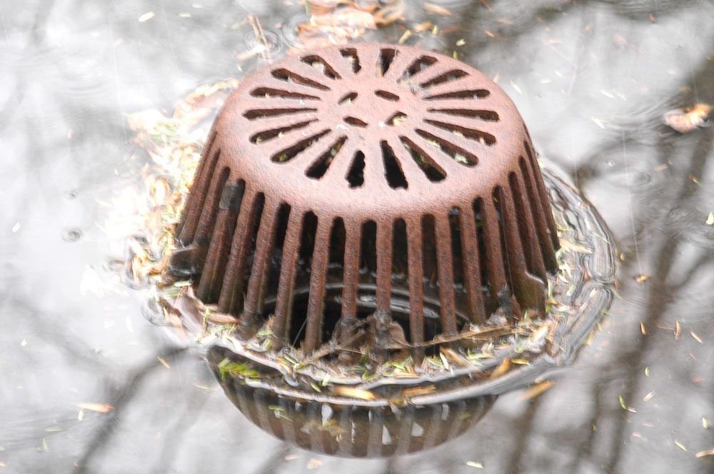 Little debris can stop a lot of water draining off a roof putting stress on the roof.