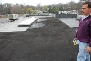 Asphalt-roof-partially-coated