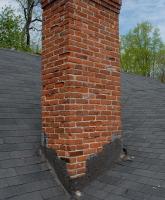 Chimney Flashing - Smearing tar does not solve the problem - Flat Roof Repair - Westport CT