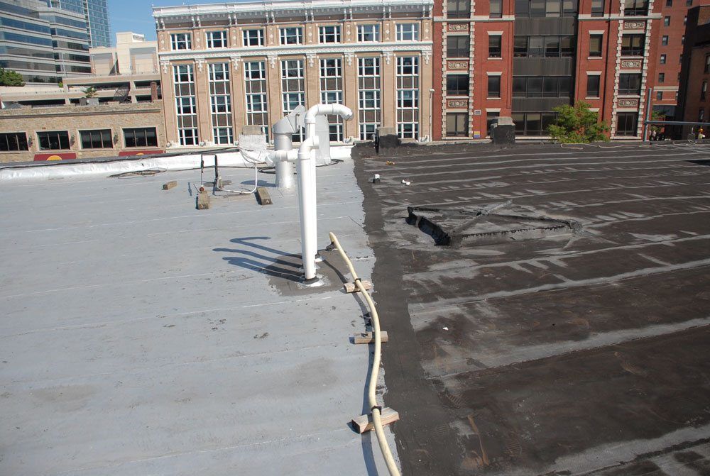 Two identical torch down roofs - One will last indefinitely and the other will need to be replaced in 10 years