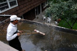 Standing water on an EPDM Rubber flat roof and started leaking