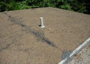 Flat Roof Repair - Hot Tar and gravel roofs have been replaced by rubber roof membranes