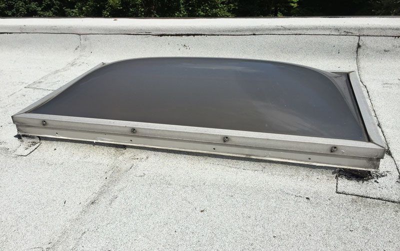 A Bubble Plexiglass skylight on a flat roof