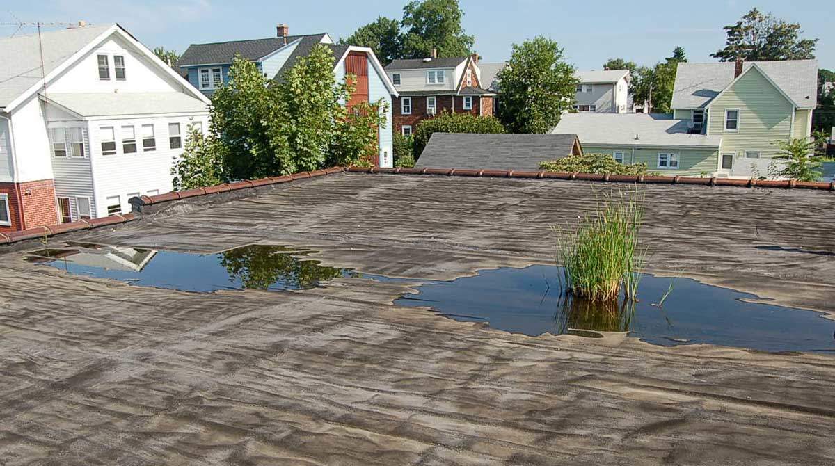 Installing a rubber roof over a gravel roof made easy. Ridgefield, CT