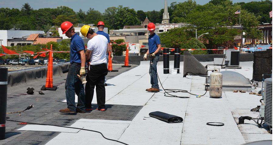 Installing a Rubber Roof over a Tar and Gravel roof