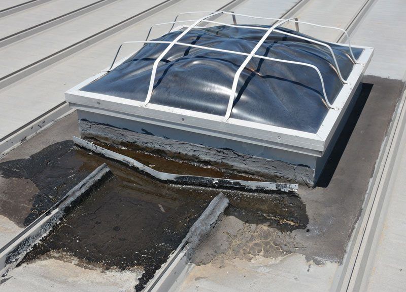 Skylight on a metal roof - repairing the flashing