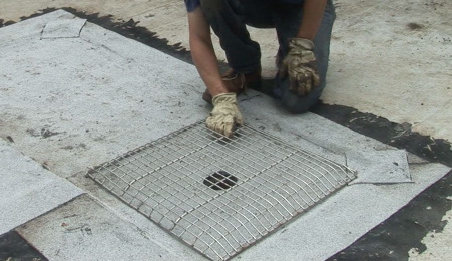 Flat Roof Drains and Strainers - This customized drain strainer improves drainage systems and the life of the roof.