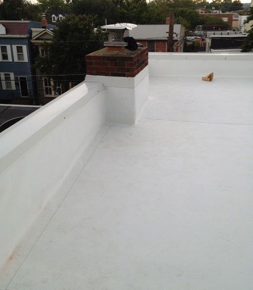 Commercial Flat Roof - A White TPO Vinyl Roof with Little UV Protection.