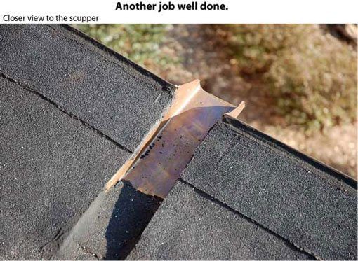 Flat roof repair - A closeup look of the scupper. 