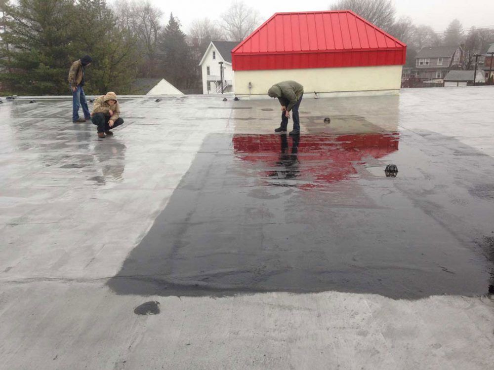 Commercial roofs in Stratford CT leaking - hard to find the leak