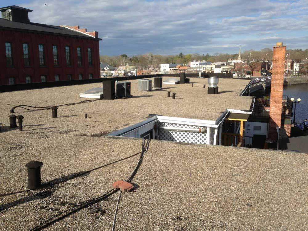 This is what a gravel roof looked like before we installed a rubber roof