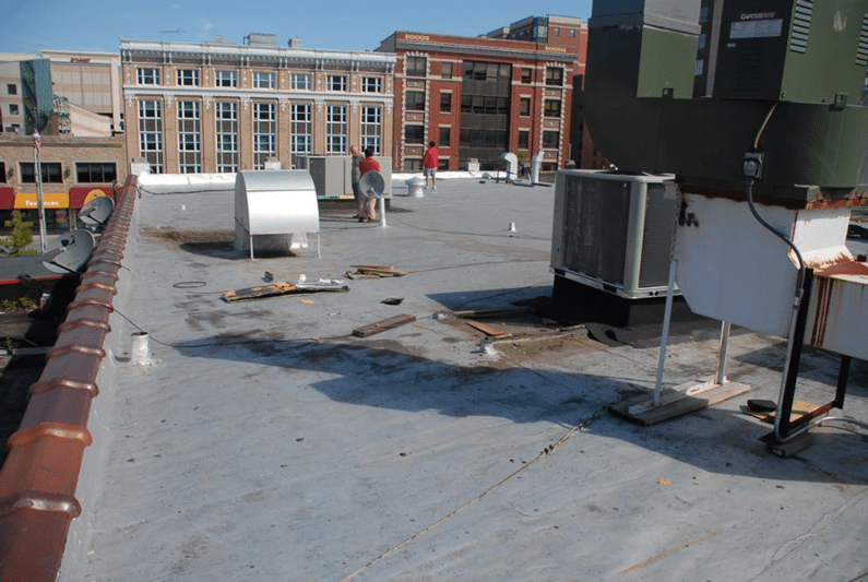 Flat roof Repairs - Modified Bitumen Rubber roofs are the best systems for Flat Roofs. New Canaan, Westport, Connecticut.