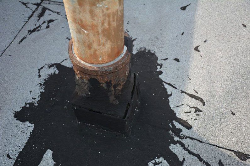 Dried tar in a pitch Pocket will cause leaks on a flat roof