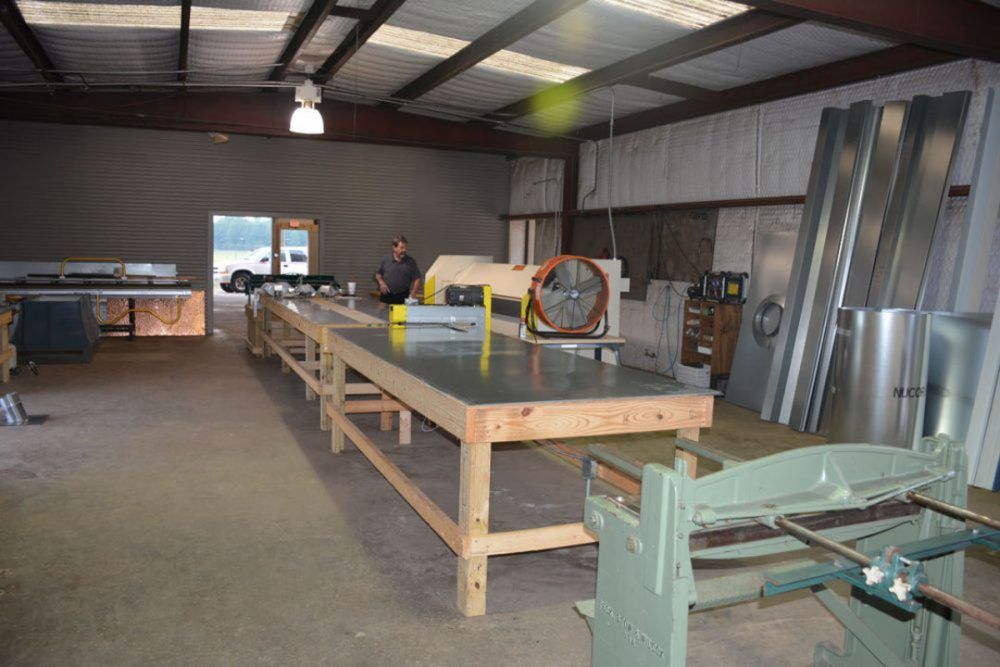 Clean Cut Roofing Metal shop - fabrication of flashing and vents Clean Cut Roofing Truck - Roofing Contractor, Tyler Texas