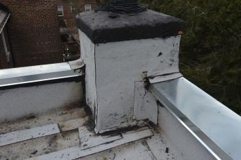 Chimney wrapped with Rubber Membrane on flat roof - Queens NY