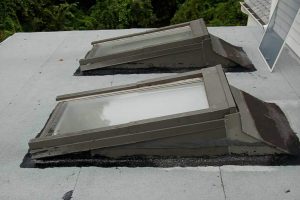Skylight leak repair on a flat roof